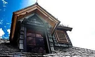 Dakkapel met houten dakbedekking isoleren