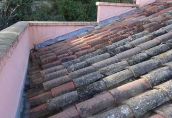 vergelijking dak renovatie huis dakpannen zink